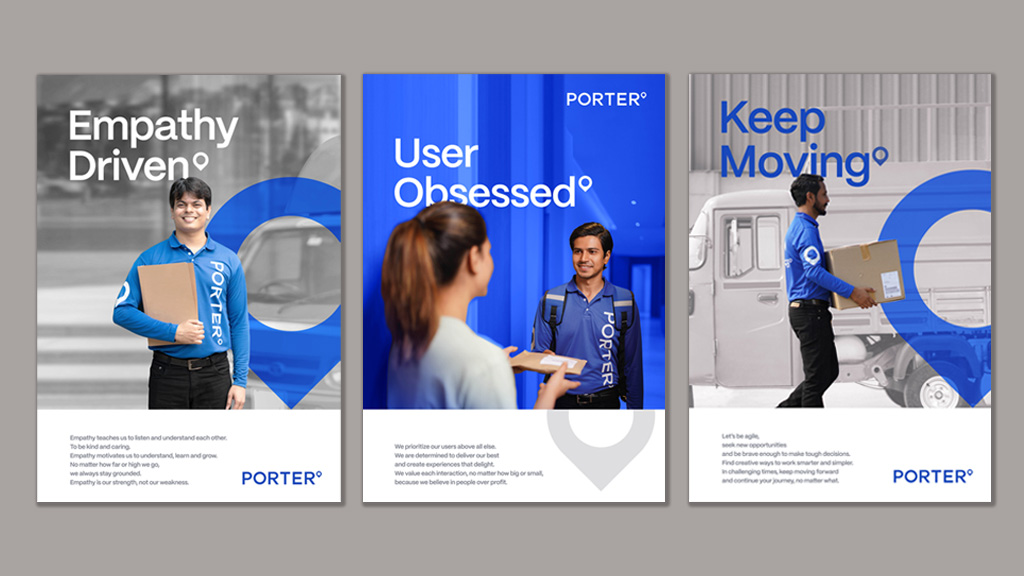 A set of posters against a grey wall